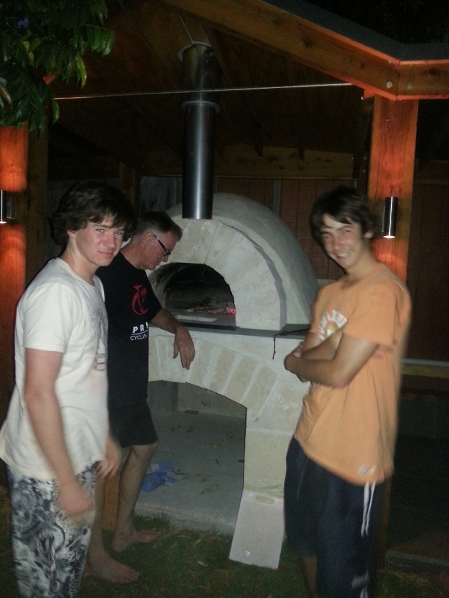 Boys keen to help with inaugural pizza